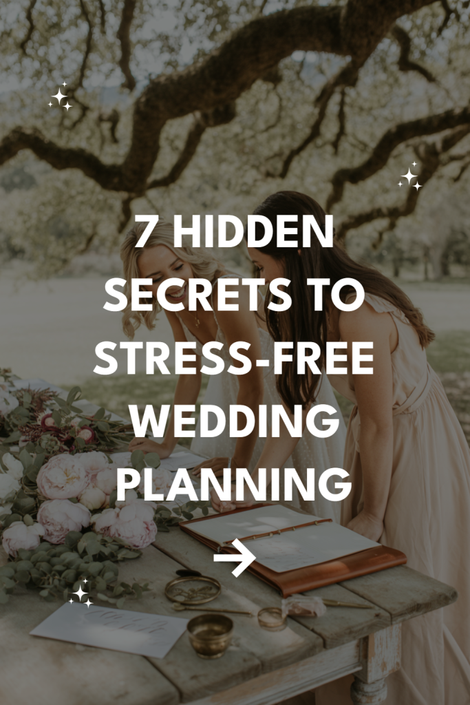 Two women enjoy stress-free wedding planning outdoors, surrounded by nature and beautiful decor.