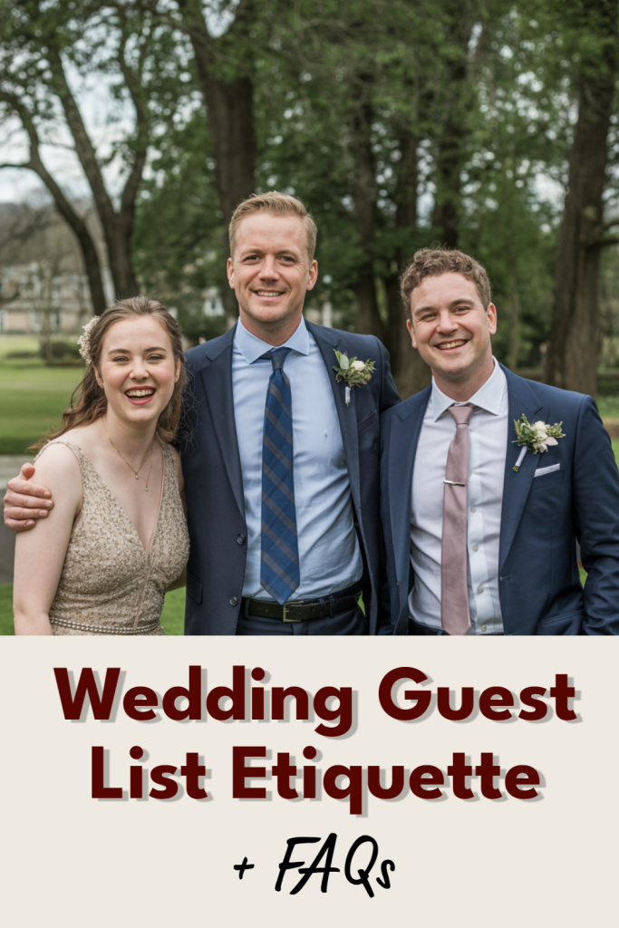 Joyful wedding guests celebrating together outdoors in elegant attire amid lush greenery.