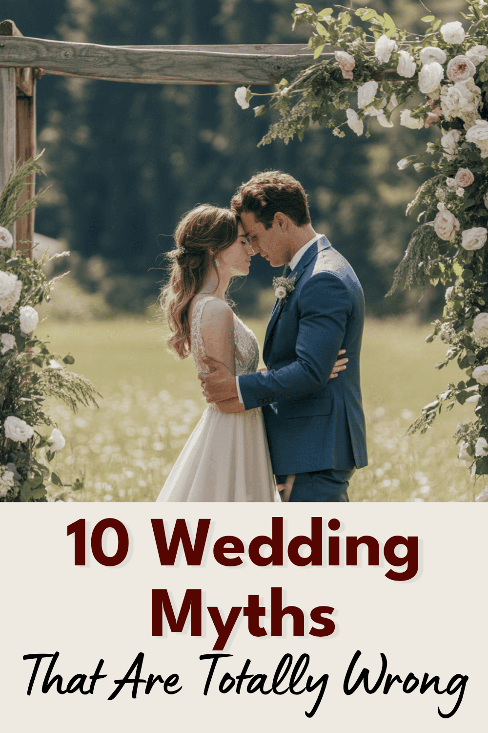 Romantic wedding couple under floral arch, exploring myth-busting wedding tips and advice.
