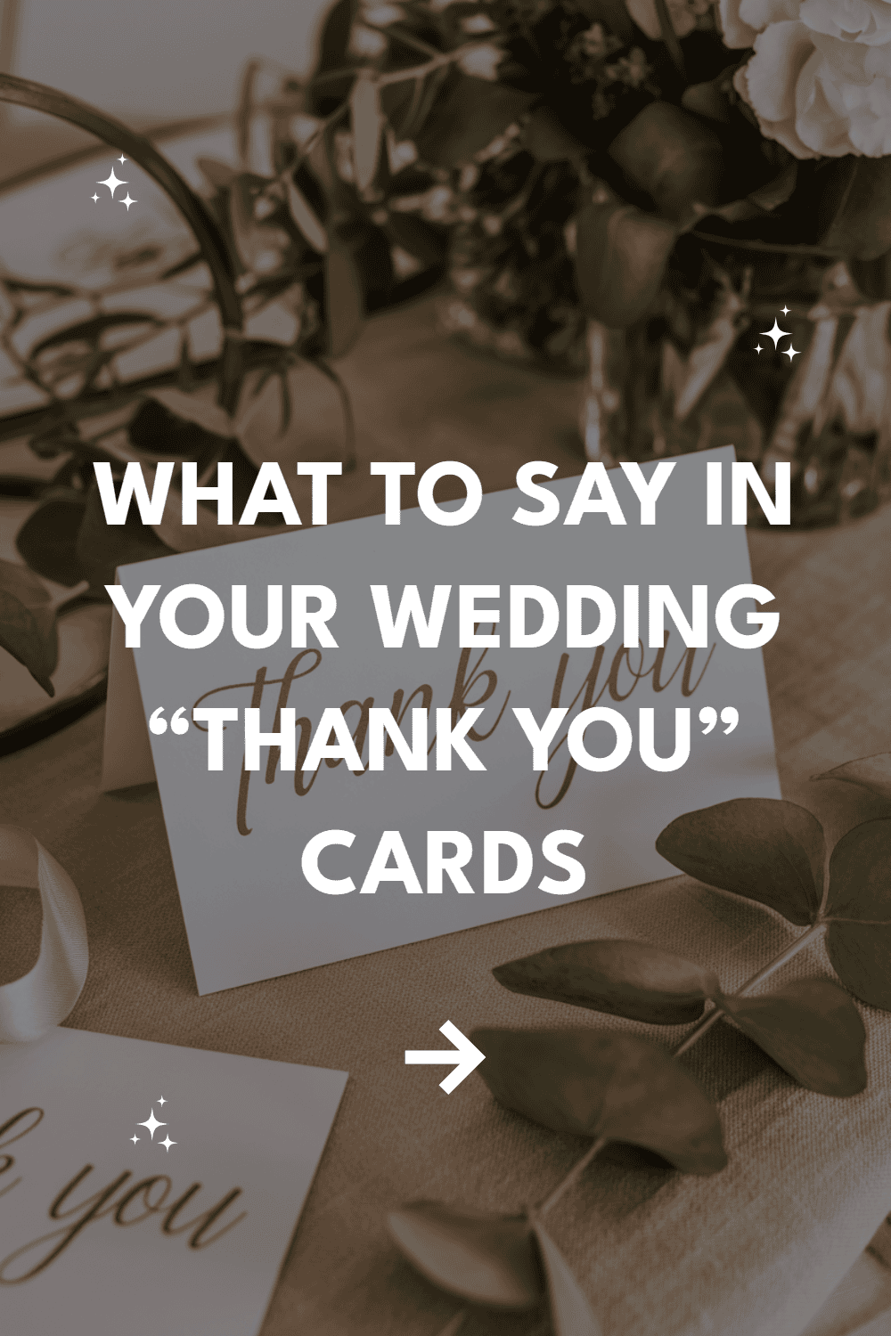 Elegant wedding thank-you card with floral arrangement and sophisticated gold lettering.