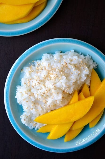 Coconut sticky rice with mango slices.