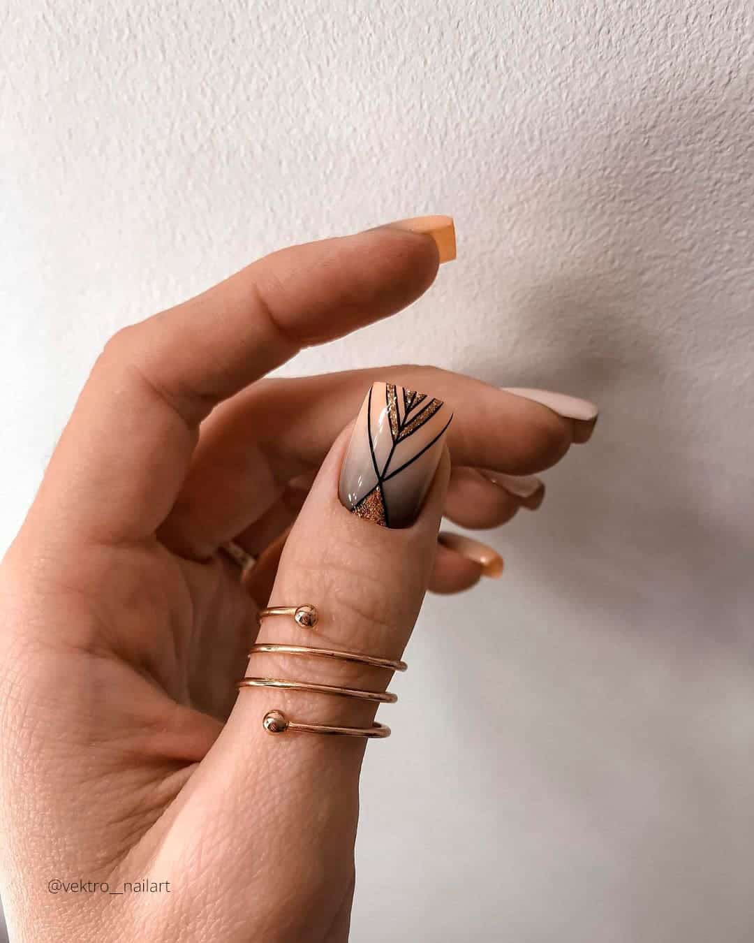 Black And Gold Ombre Nails