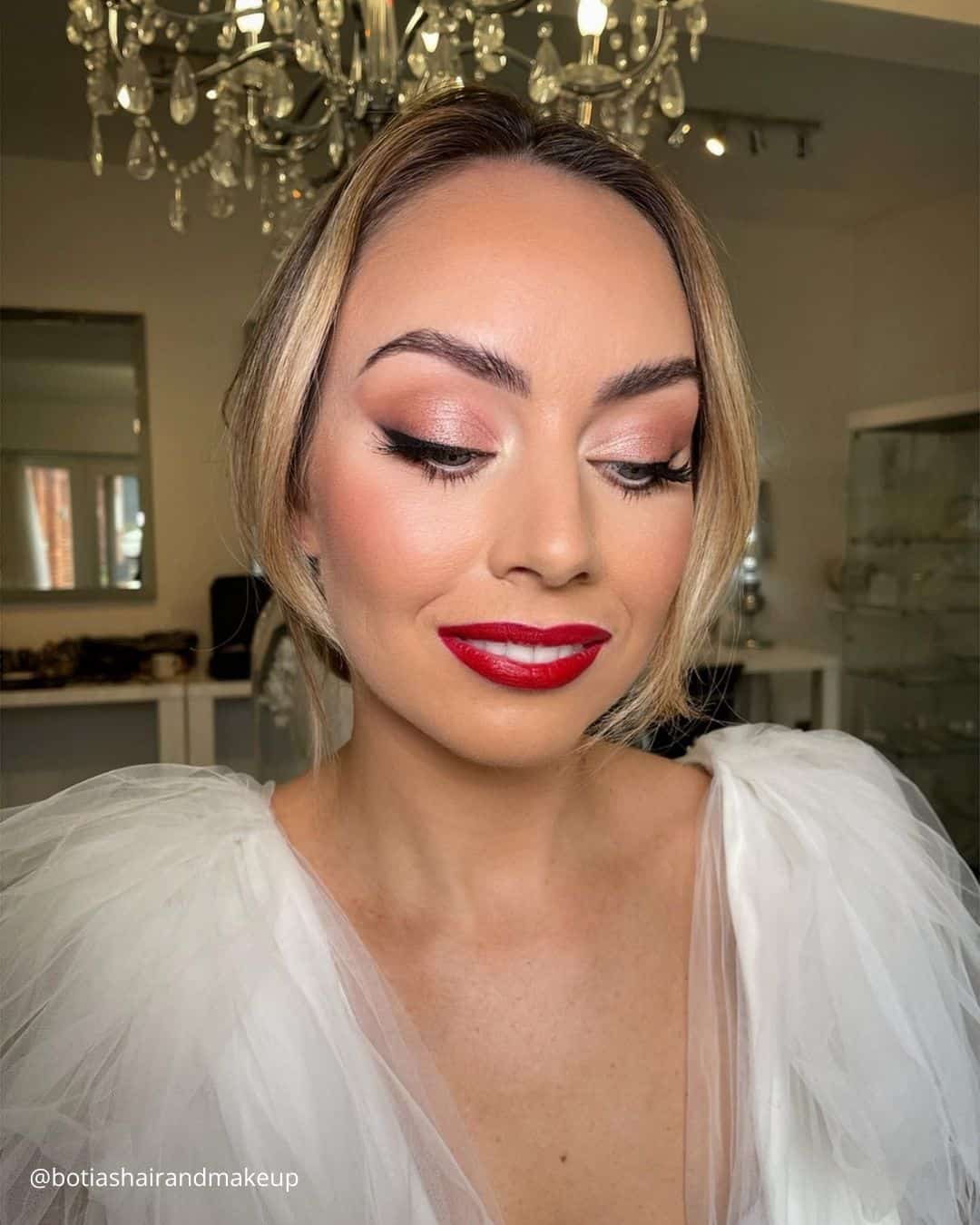 Bold Winged Eyeliner and Red Lipstick