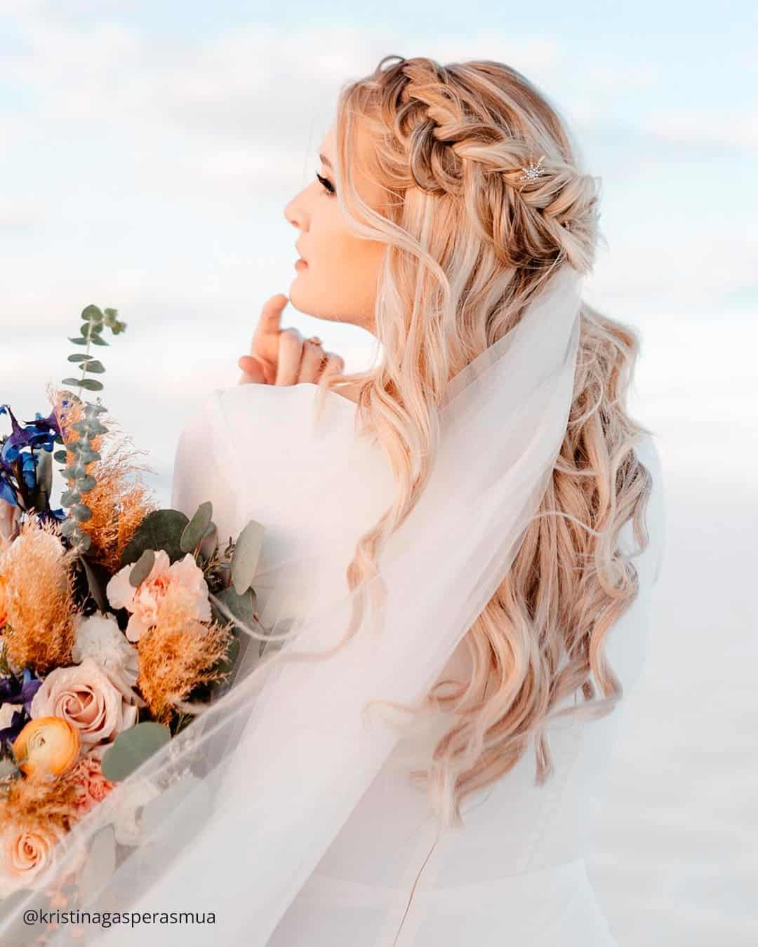 Bridal Look with Veil and Flowers