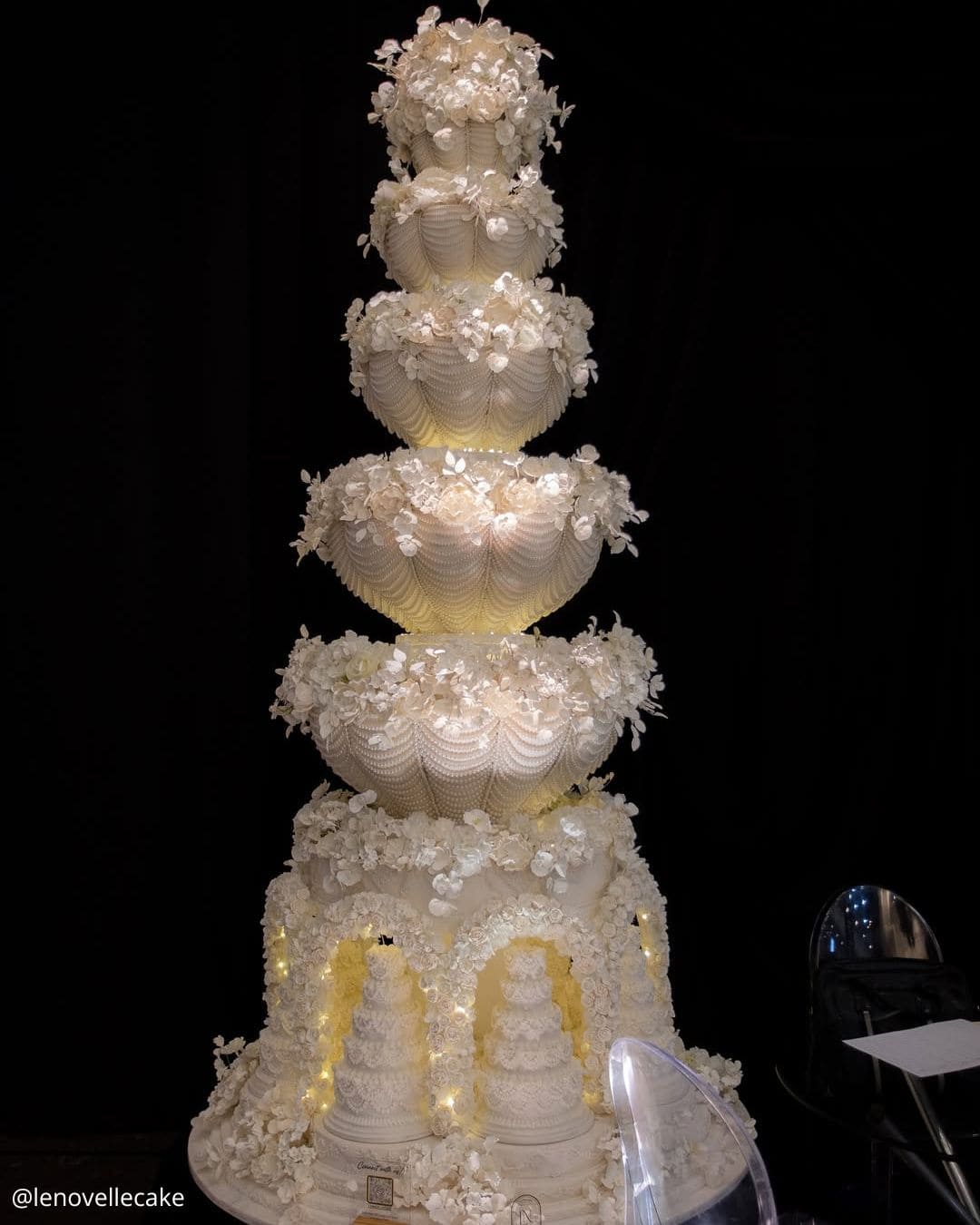 unique wedding cakes luxurious multi tiered white palace style cake with intricate carvings and lights lenovellecake