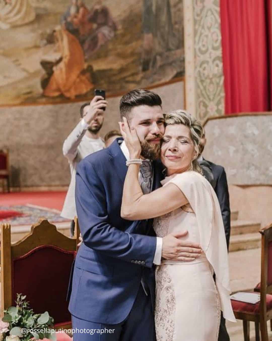 Bride and groom with both sets of parents
