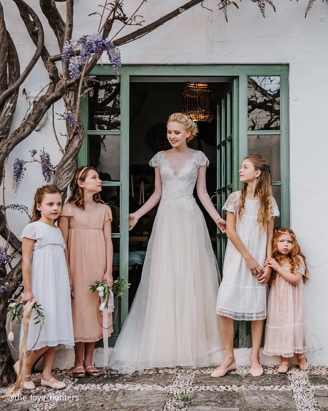 Bride and groom with nieces, nephews, or young relatives