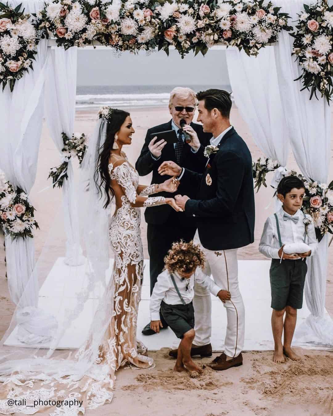Bride and groom with nieces, nephews, or young relatives