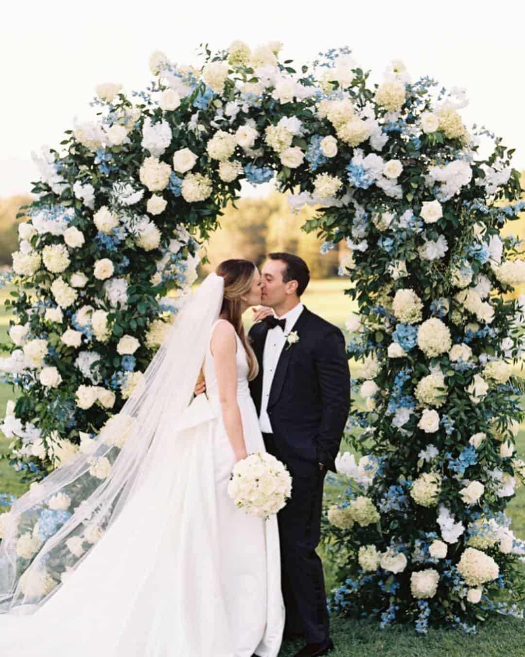 wedding ceremony decorations white blue arch southern blooms
