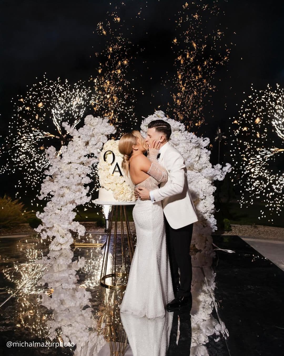 wedding photos magical night kiss of brides on the background of fireworks michalmazurphoto