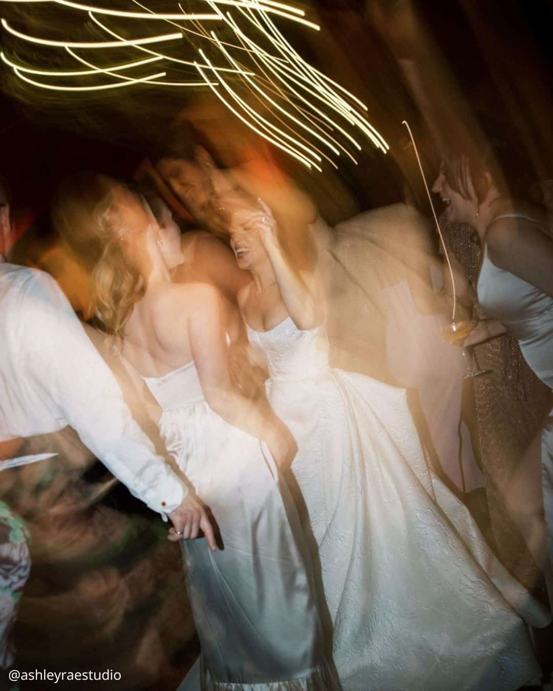 wedding photos fun evening blurry photo with shining lights ashleyraestudio