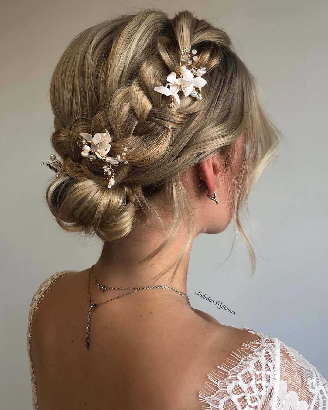 Cultural Grace: Traditional Braided Bun With Floral Kanzashi