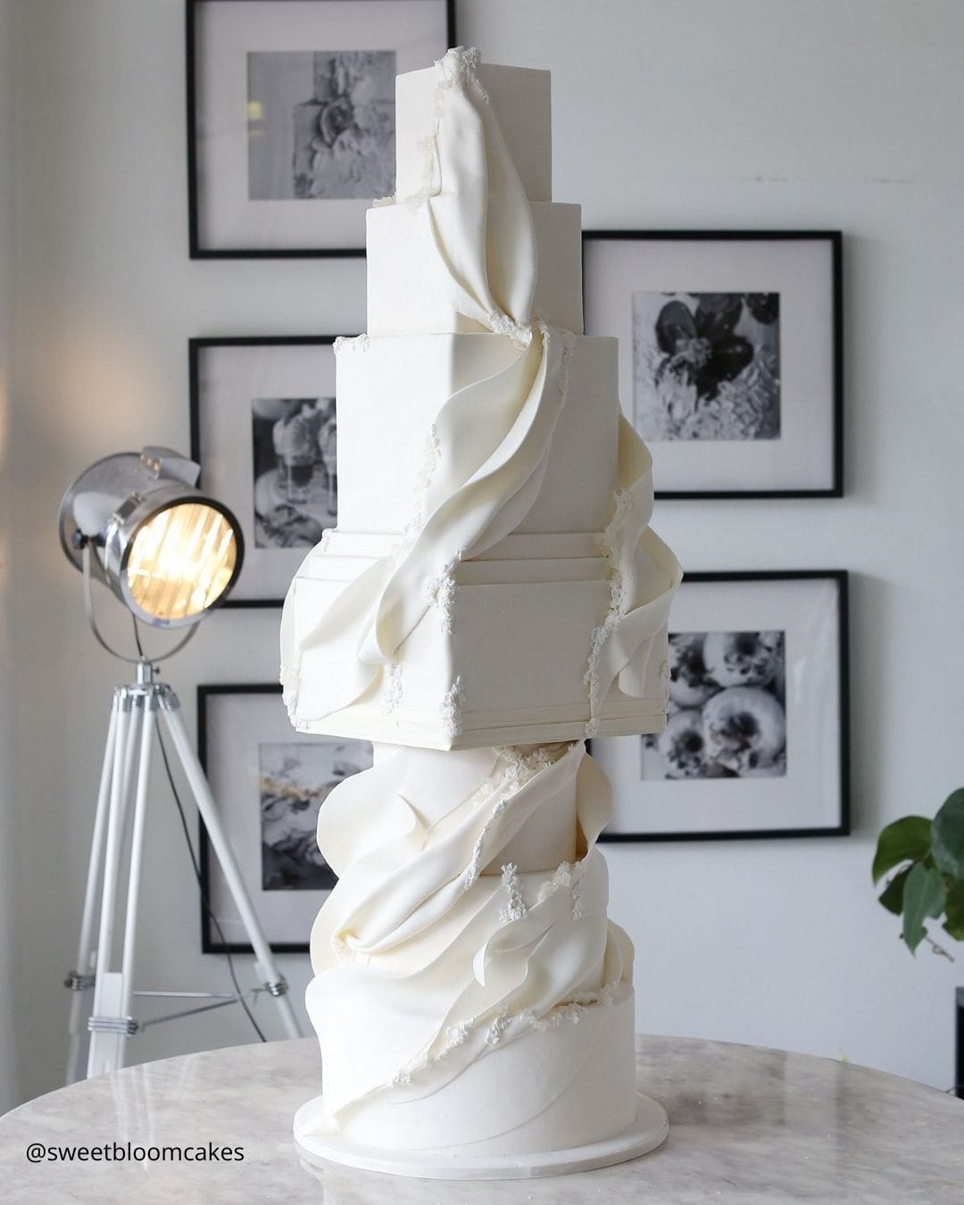 wedding cake trends unusula composition of geometrical white wedding cake standing on classic three tier wedding cake