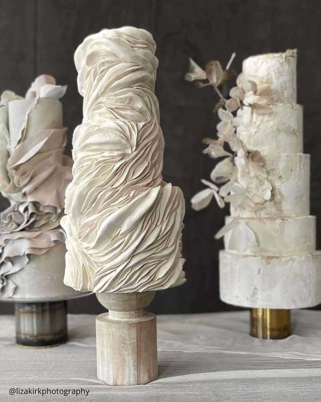 wedding cake trend three modern ruffled white wedding cakes