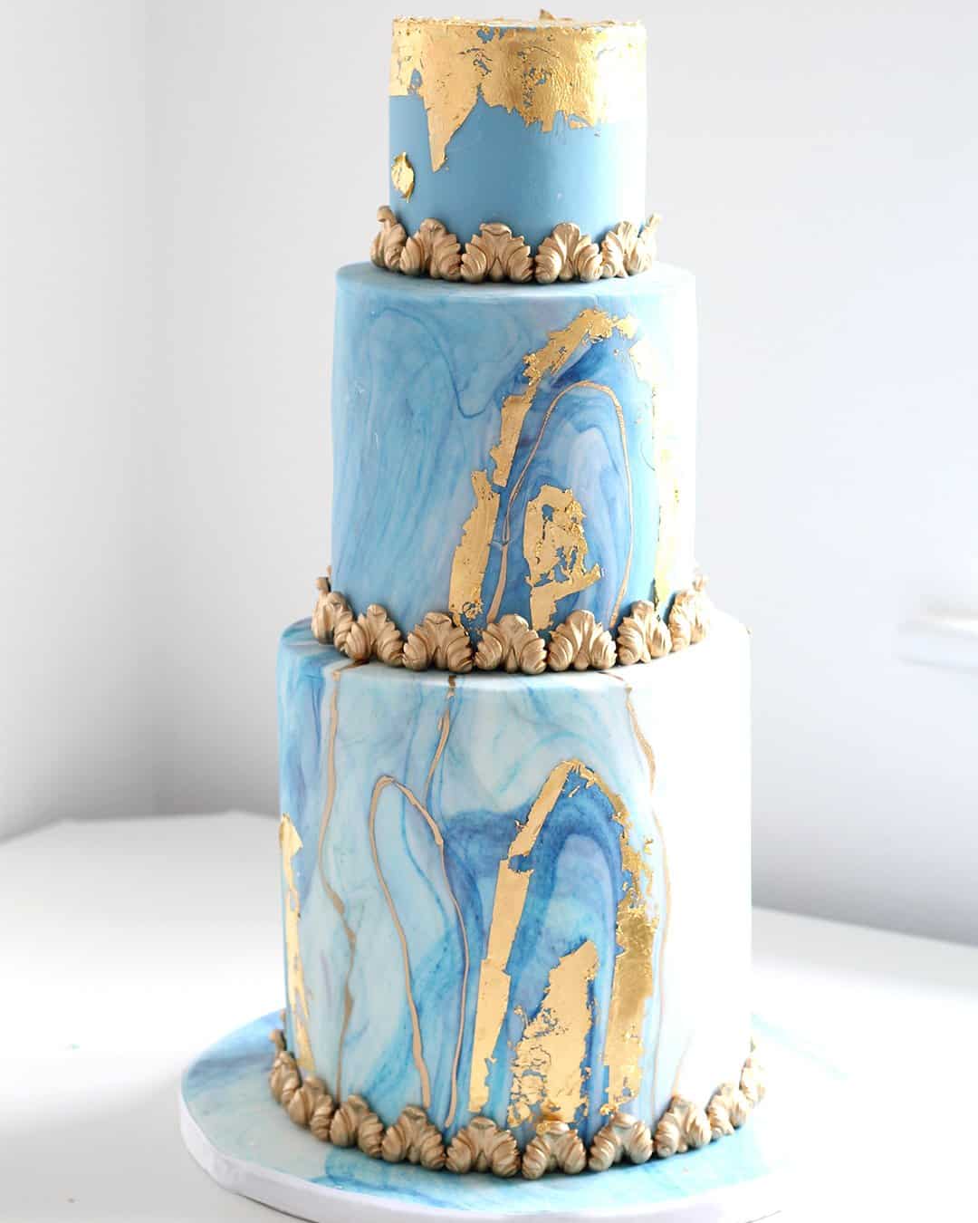 wedding cake trends Blue marble cake 3 tier elizabethscakeemporium