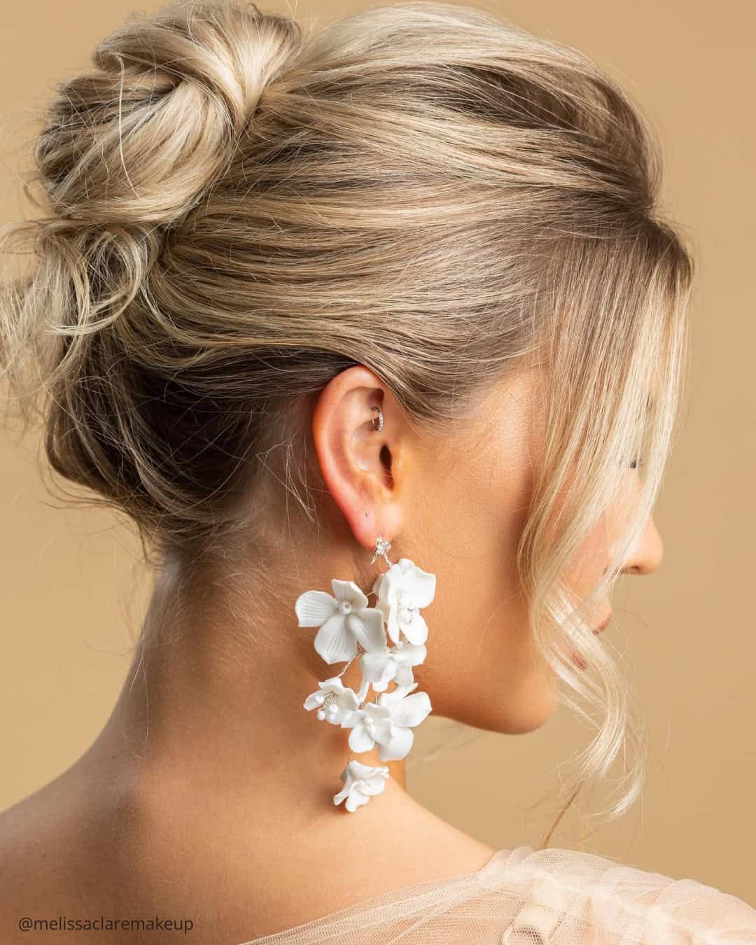 Low Bun With Wispy Bangs