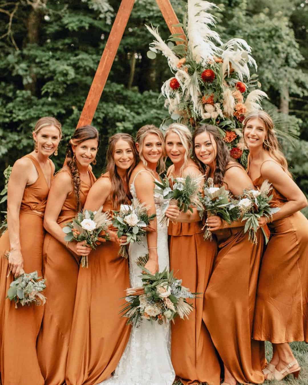 Which skin tone does rust orange dress bridesmaid the most?