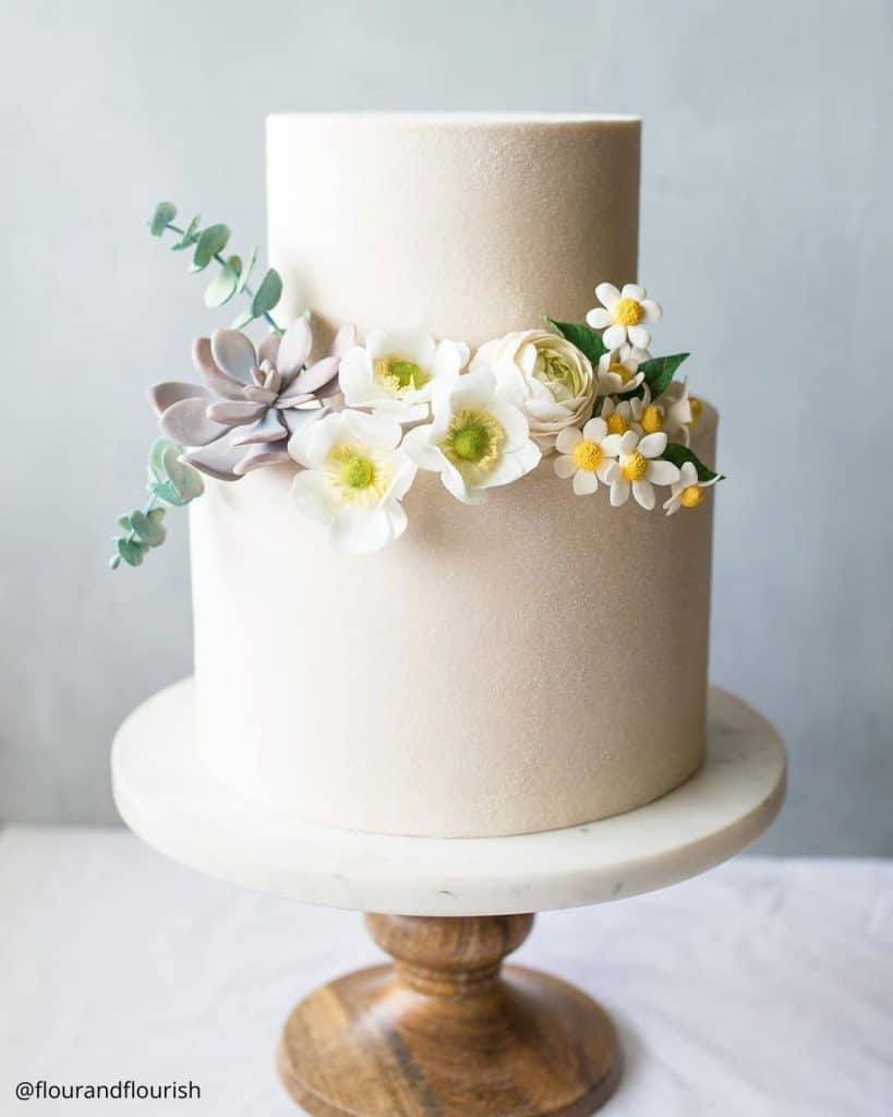 White Cakes With Flowers Decorations