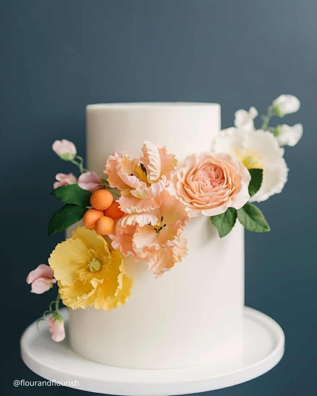 White Cakes With Flowers Decorations