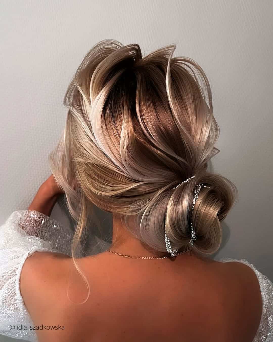 Curly Side Bun Wedding Hairstyle